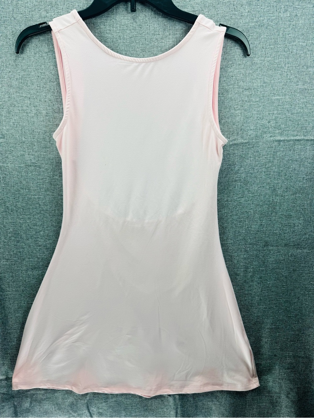 Woman’s pink sleeveless dress